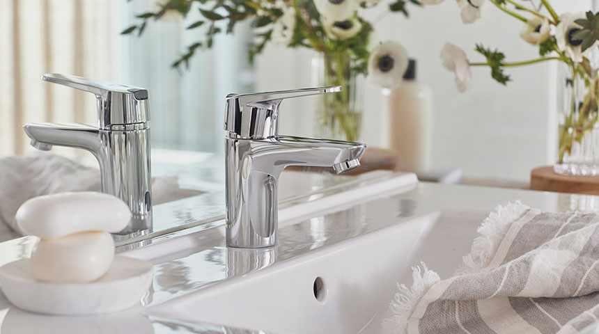 Oras Vega washbasin faucet has an ECO button which also works as a safety feature-